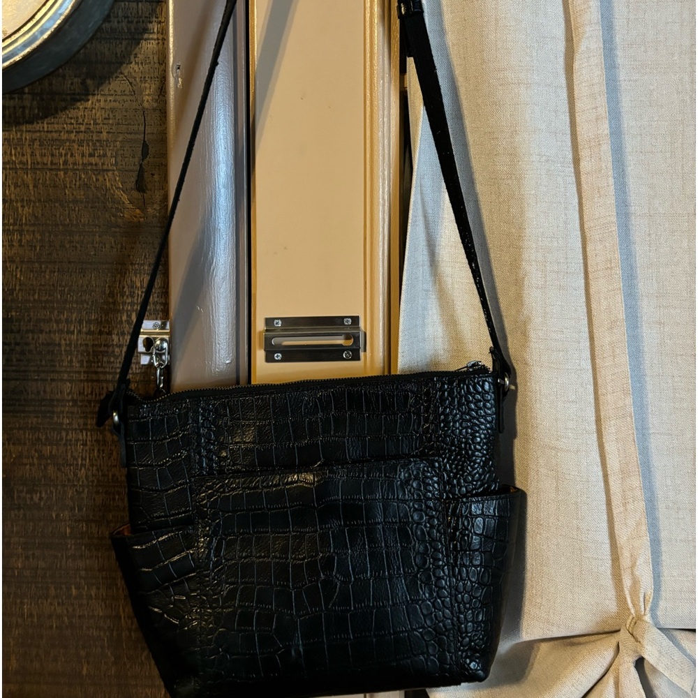 Black leather tooled bag
